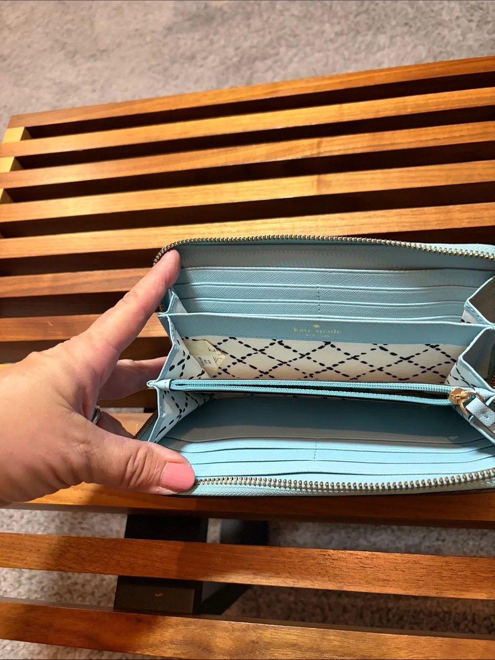 kate spade pale blue zip-around wallet